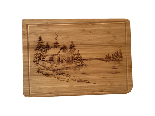 Christmas Cabin bamboo serving board on white background, straight-on view.