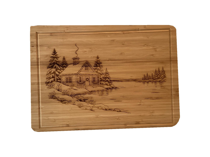 Christmas Cabin bamboo serving board on white background, straight-on view.