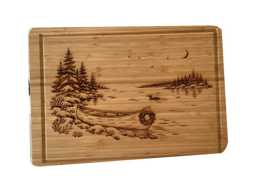 Christmas Canoe bamboo serving board on white background, straight-on view.