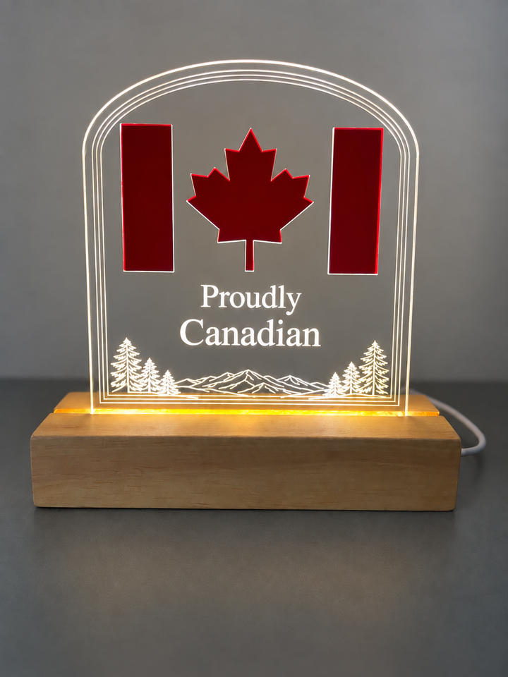 Redesigned Proudly Canadian acrylic LED display with warm illuminated wood base